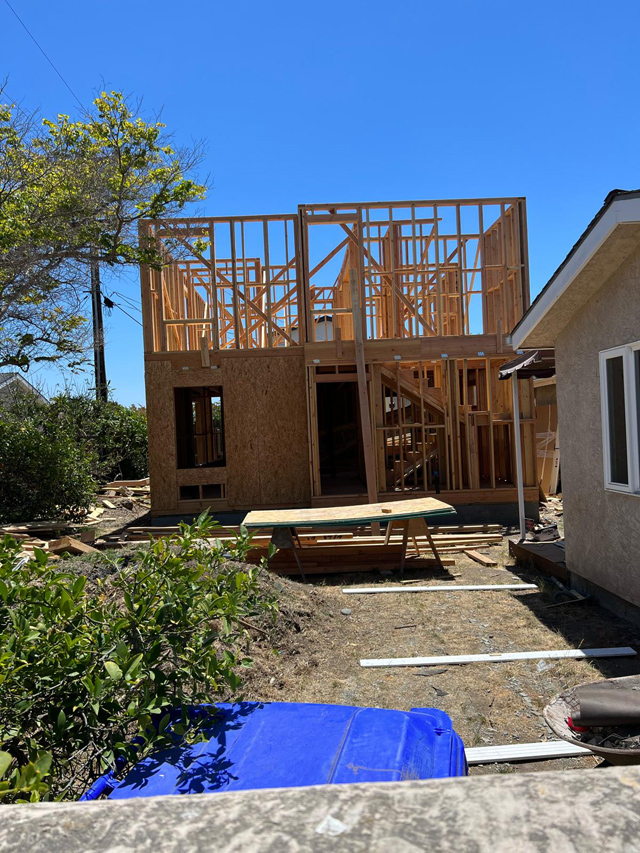 Two-story wood house frame in progress