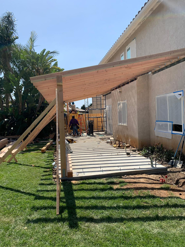 Sturdy wooden frames for outdoor deck roof, offering reliable support and a natural look.
