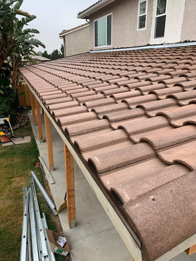 Classic tile roof for outdoor deck, providing durable weather protection and style.