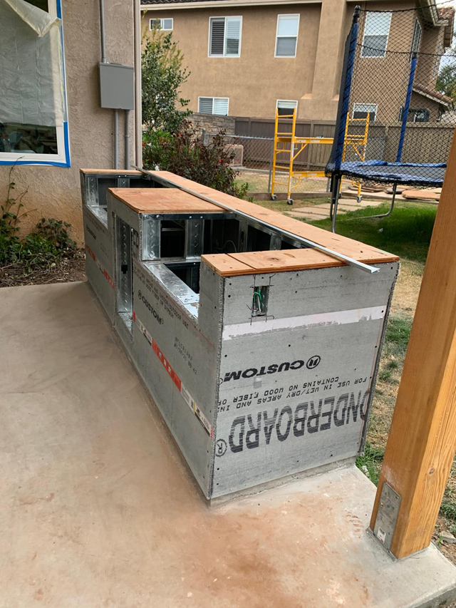 Construction of outdoor deck grill, built for durability and outdoor cooking.