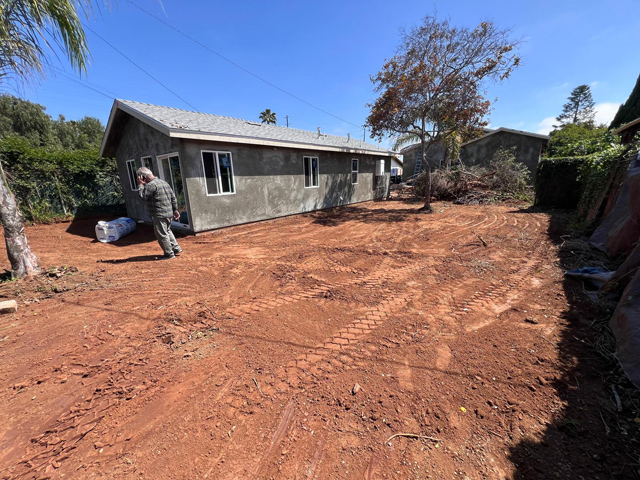 Ground cleared and leveled, ready for construction.