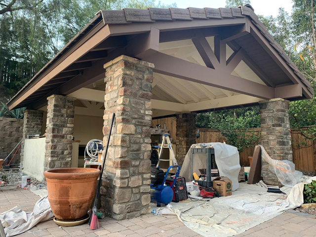 New roof installed on patio deck, enhancing durability and style.