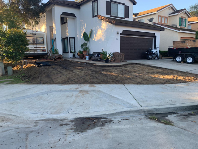 Preparation for outdoor cement driveway, ensuring a solid foundation and smooth finish.
