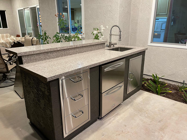 Functional faucet installed on outdoor deck for convenience and easy access.